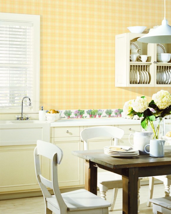 kitchen with yellow and green plaid wallcovering and herb pots border